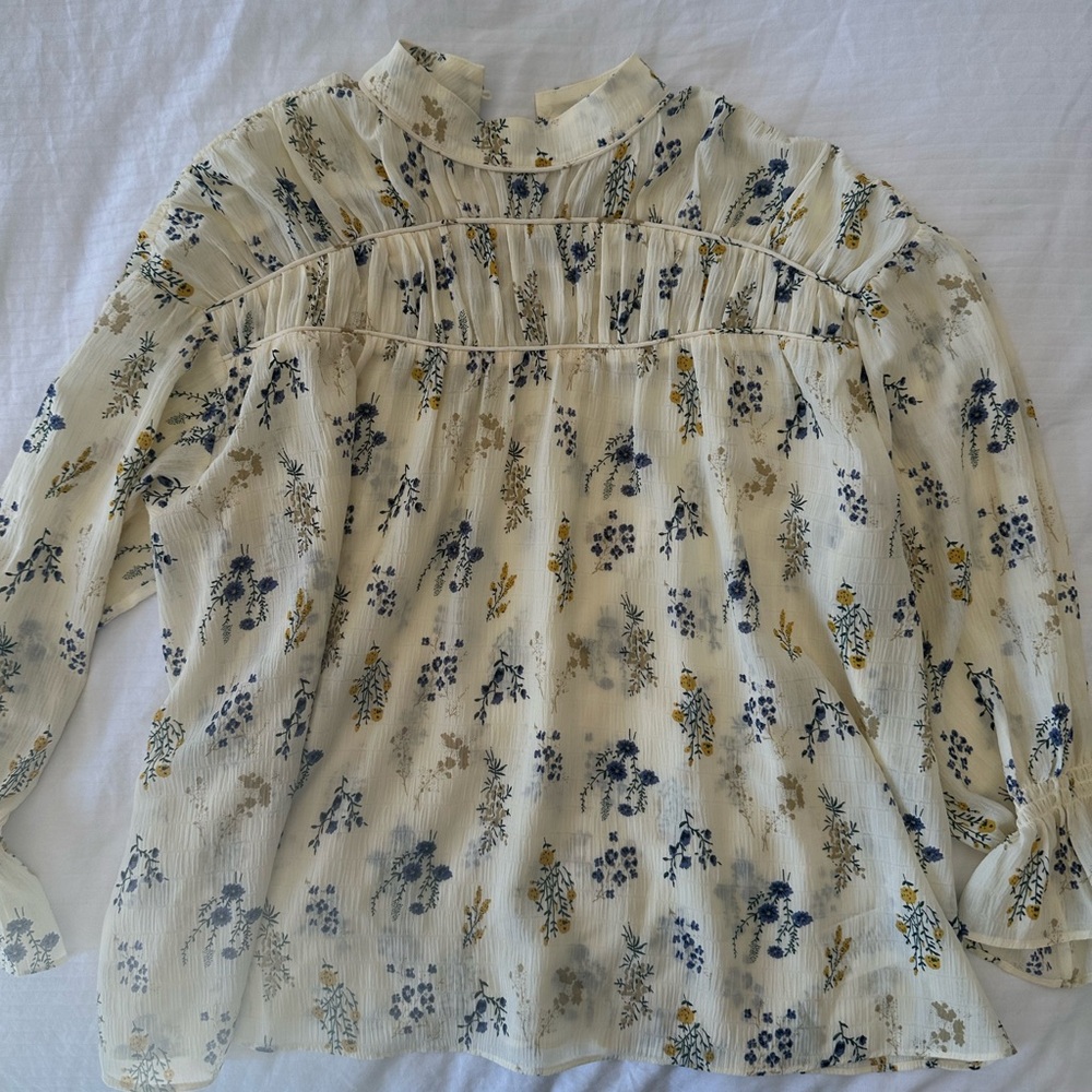 Bash high neck floral blouse.